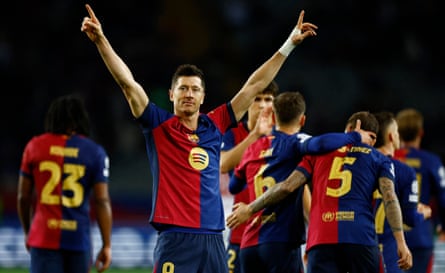 Robert Lewandowski celebrates after Barcelona’s victory.