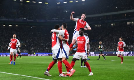 Gabriel Martinelli is mobbed by Jurriën Timber, Bukayo Saka and Declan Rice after the Brazilian’s quickfire opener at Sporting.